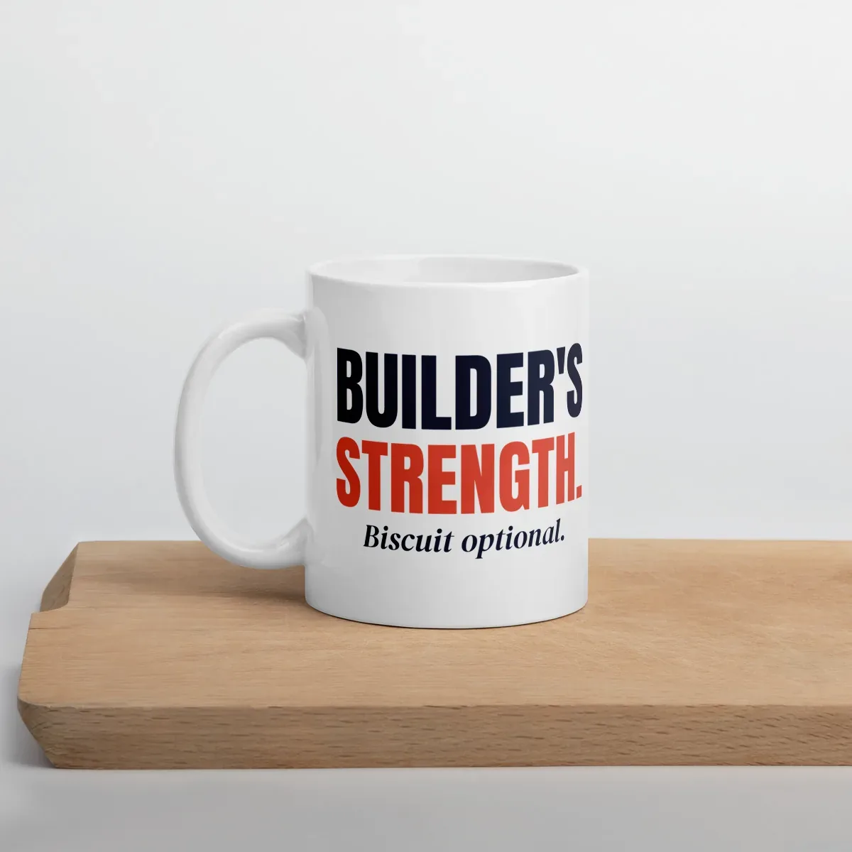 Builder's strength. Biscuit optional. — 11oz mug: Lifestyle, cutting board