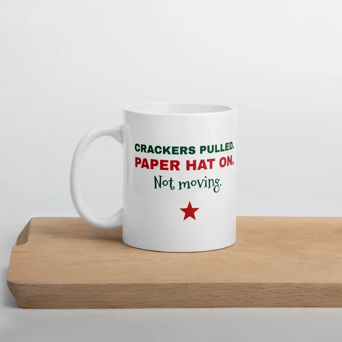 Crackers pulled. Paper hat on. Not moving. — 11oz mug: Lifestyle, cutting board