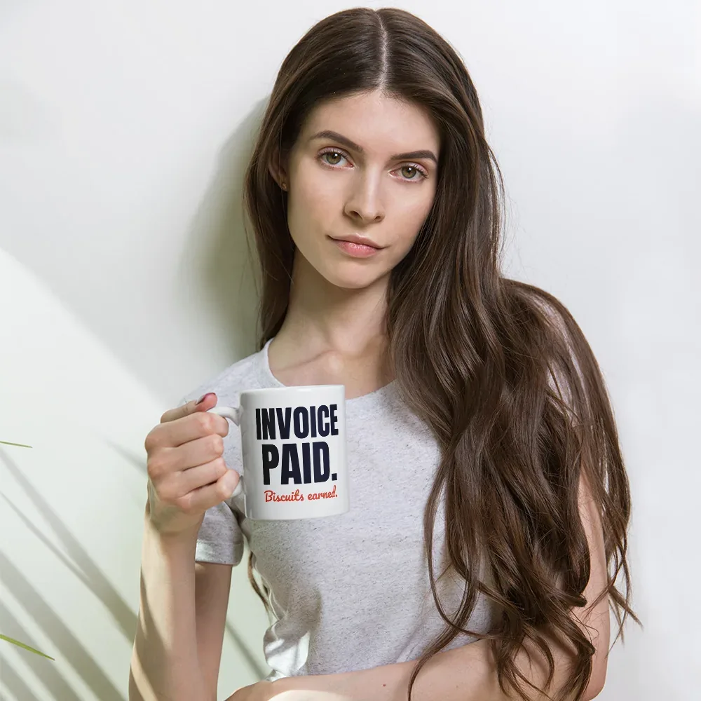 Invoice paid. Biscuits earned — 11oz mug: In hand (lifestyle)