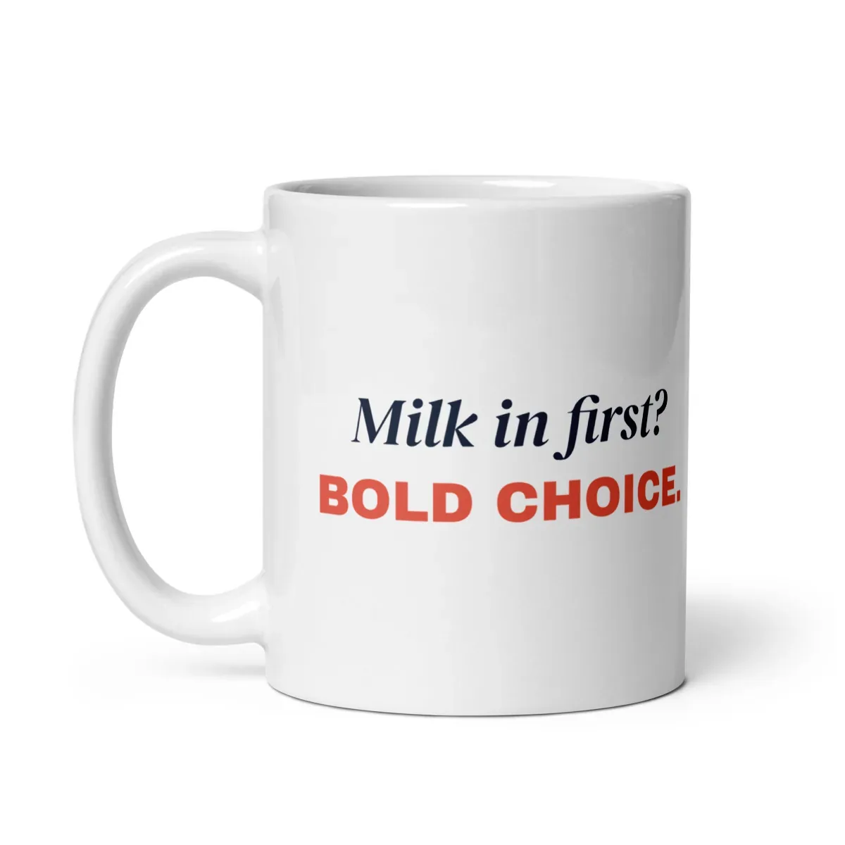 Milk in first? Bold choice — 11oz mug: Handle side
