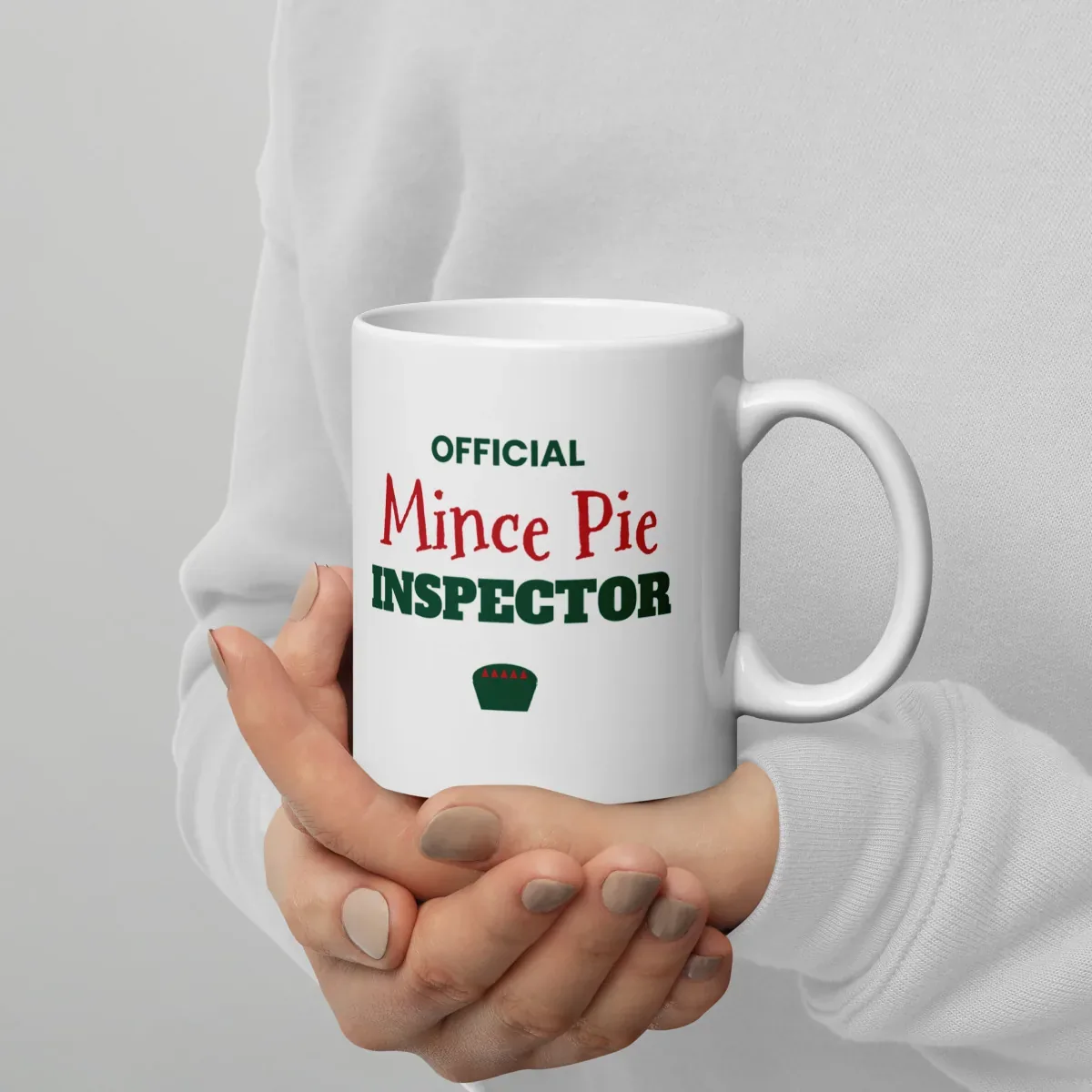 Official Mince Pie Inspector — 11oz mug: In hand