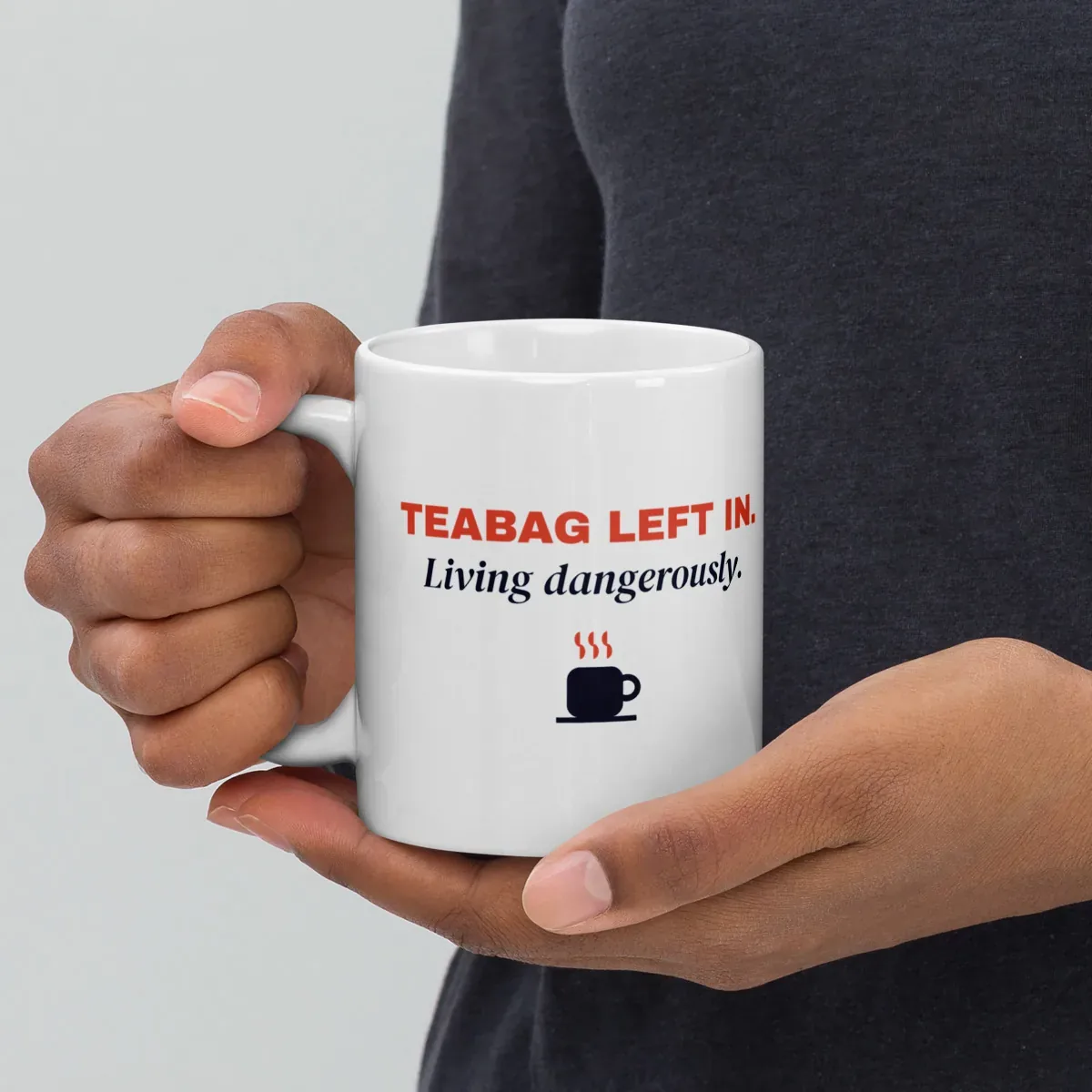 Teabag left in. Living dangerously. — 11oz mug: Lifestyle, handle on left
