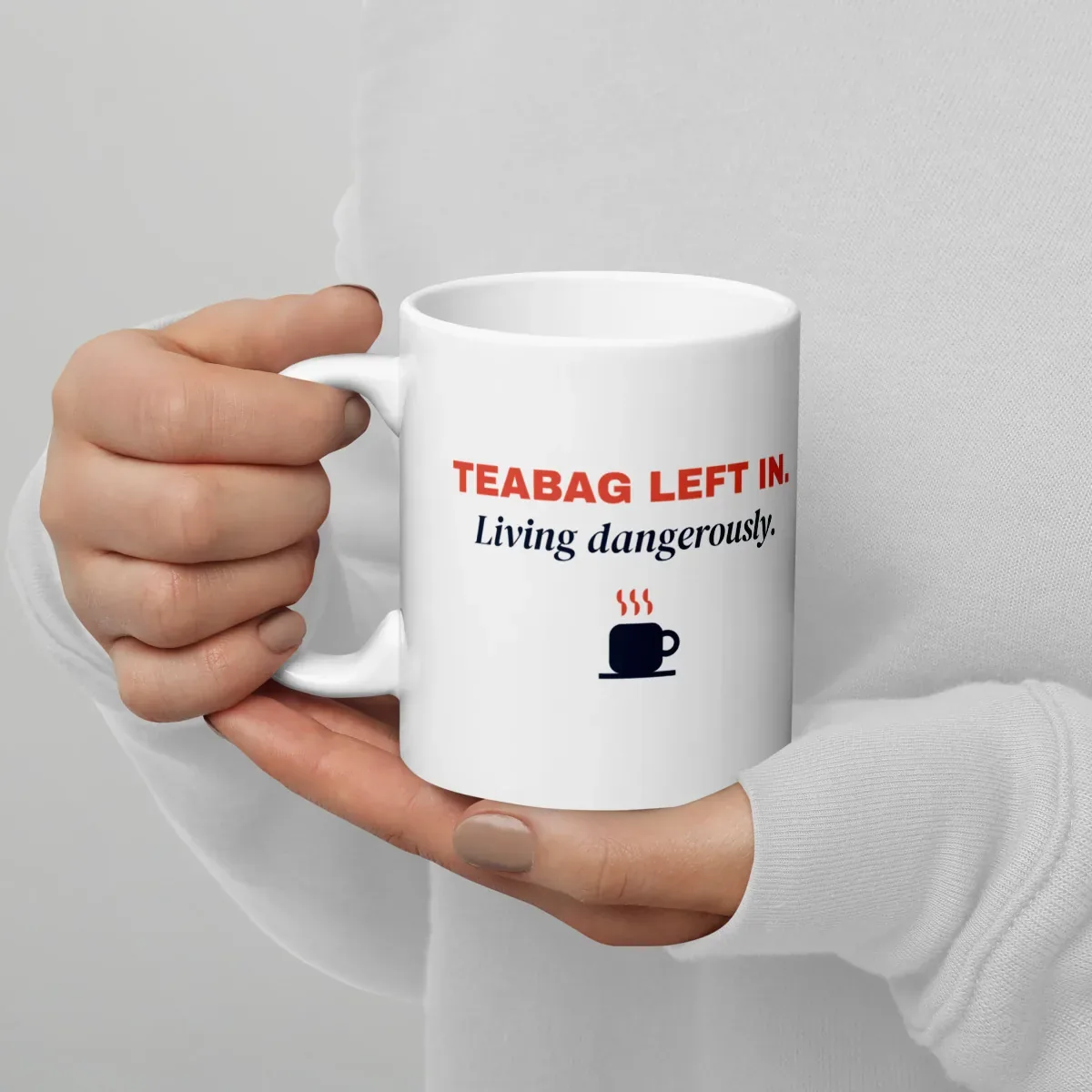 Teabag left in. Living dangerously. — 11oz mug: Lifestyle, handle on left