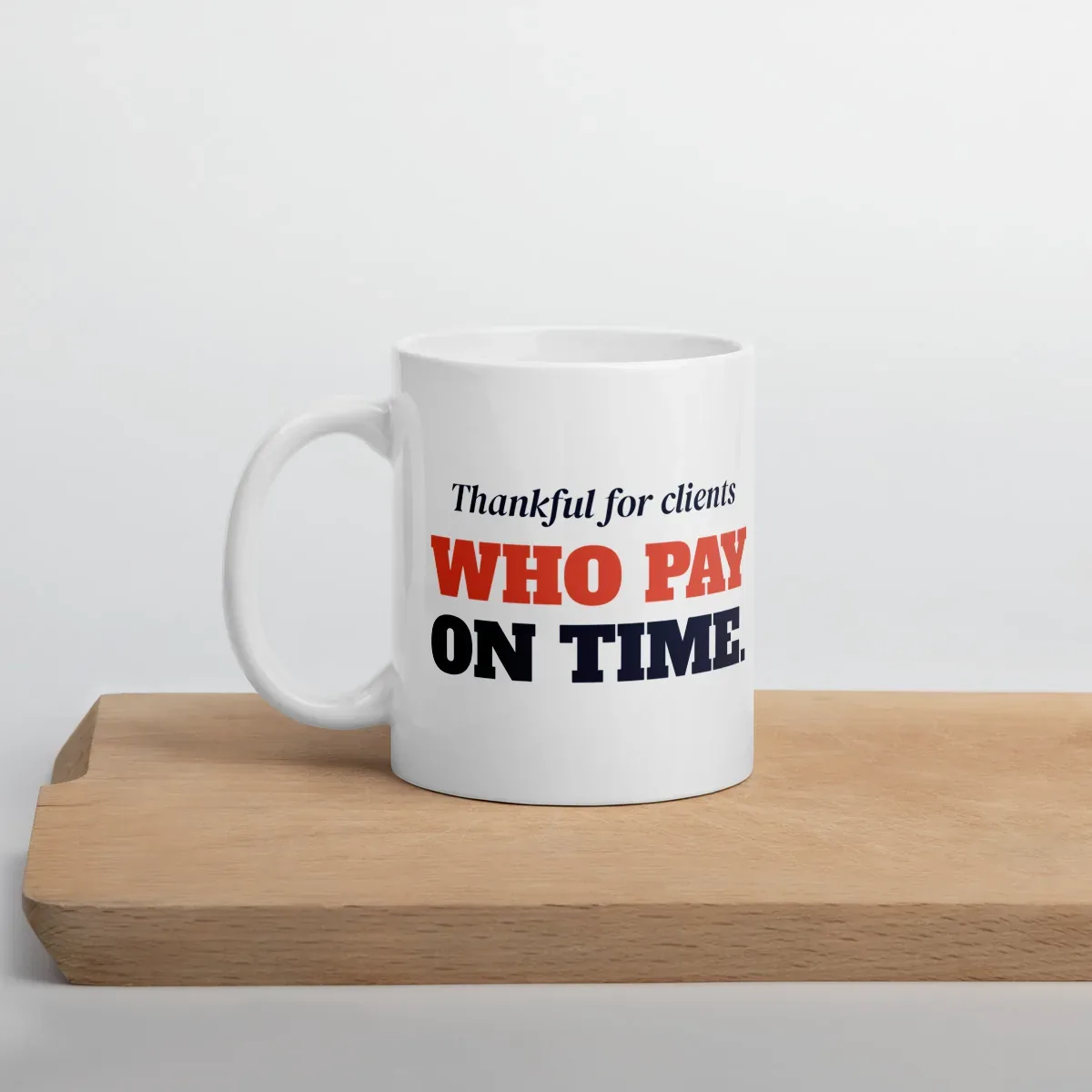 Thankful for clients who pay on time — 11oz mug: Lifestyle, cutting board