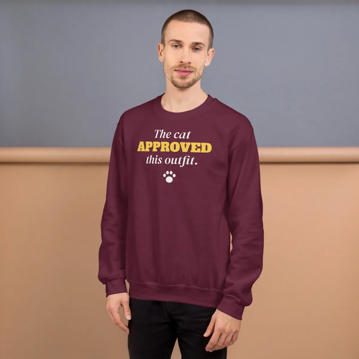 The cat approved this outfit — maroon unisex sweatshirt: On model, front
