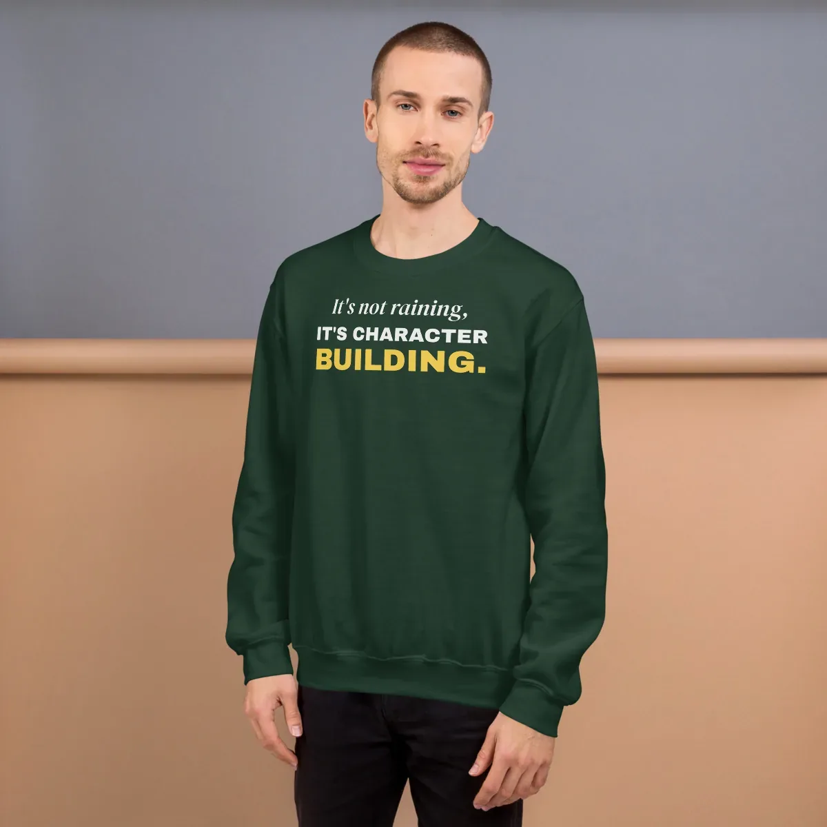 It's not raining, it's character building — forest green unisex sweatshirt: On model, front