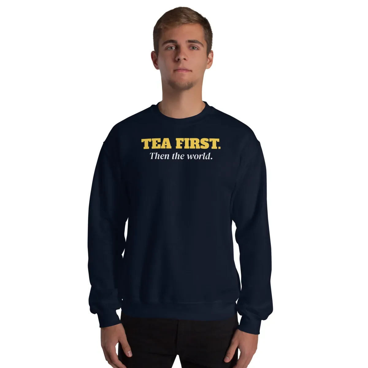 Tea first. Then the world — navy unisex sweatshirt: Worn (model)