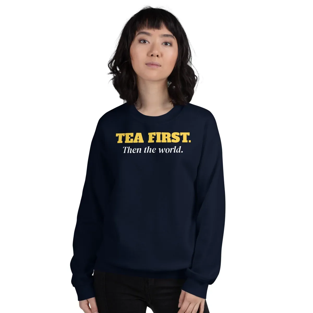 Tea first. Then the world — navy unisex sweatshirt: Worn (model)