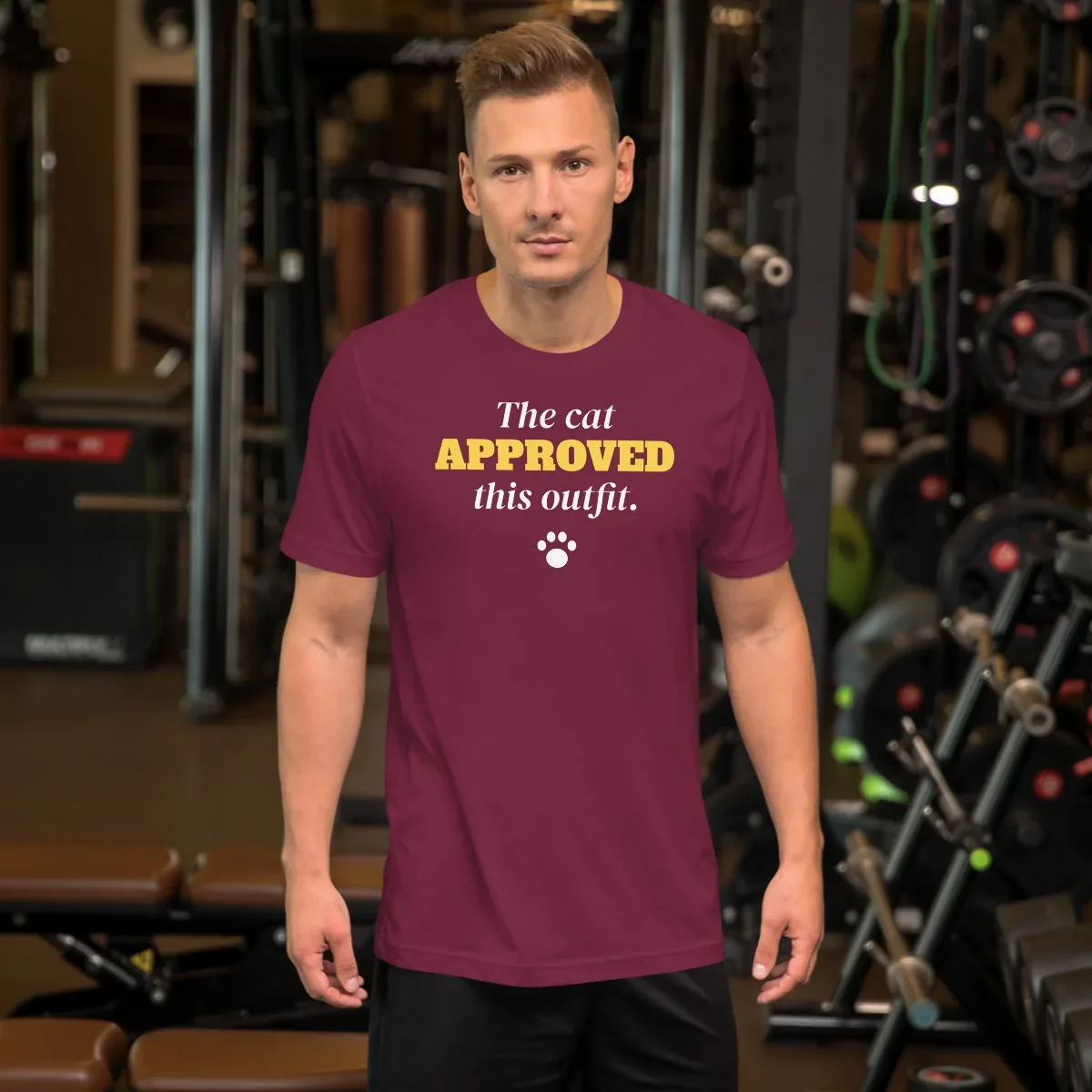 The cat approved this outfit — maroon unisex tee: On model, front