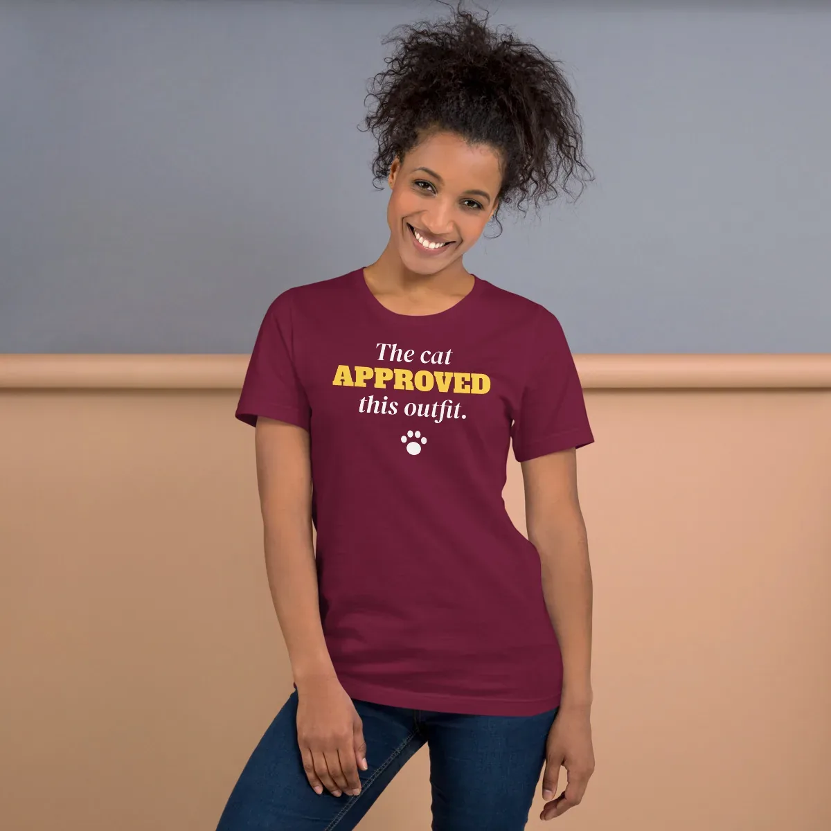 The cat approved this outfit — maroon unisex tee: On model, front