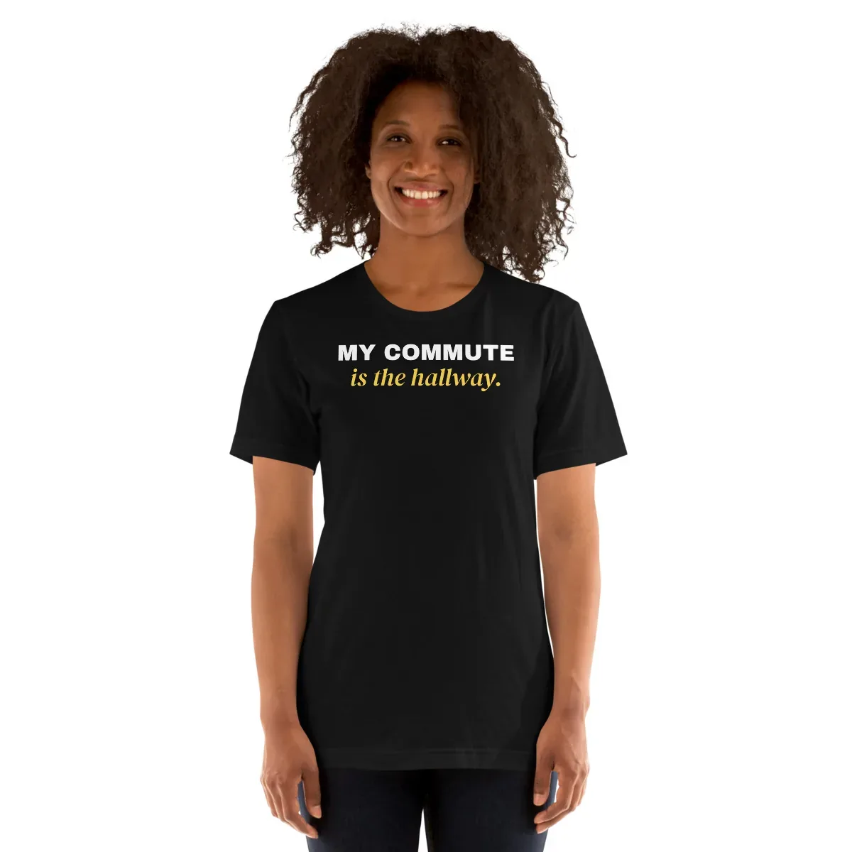 My commute is the hallway — black unisex tee: Worn (model)