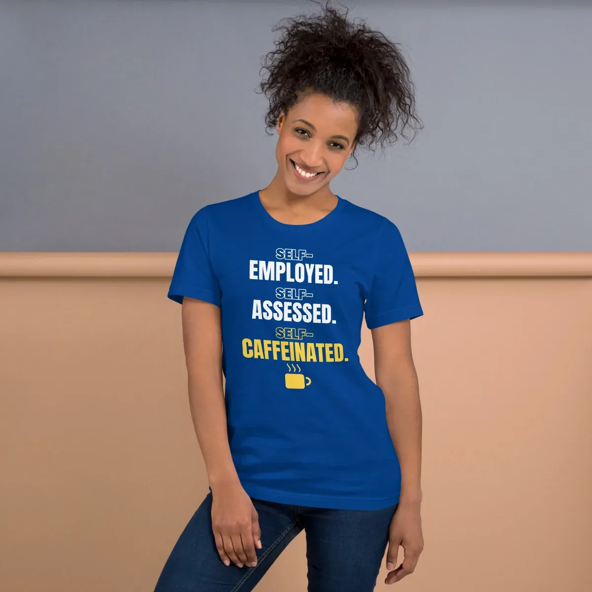 Self-employed. Self-assessed. Self-caffeinated. — unisex tee: Worn (lifestyle)
