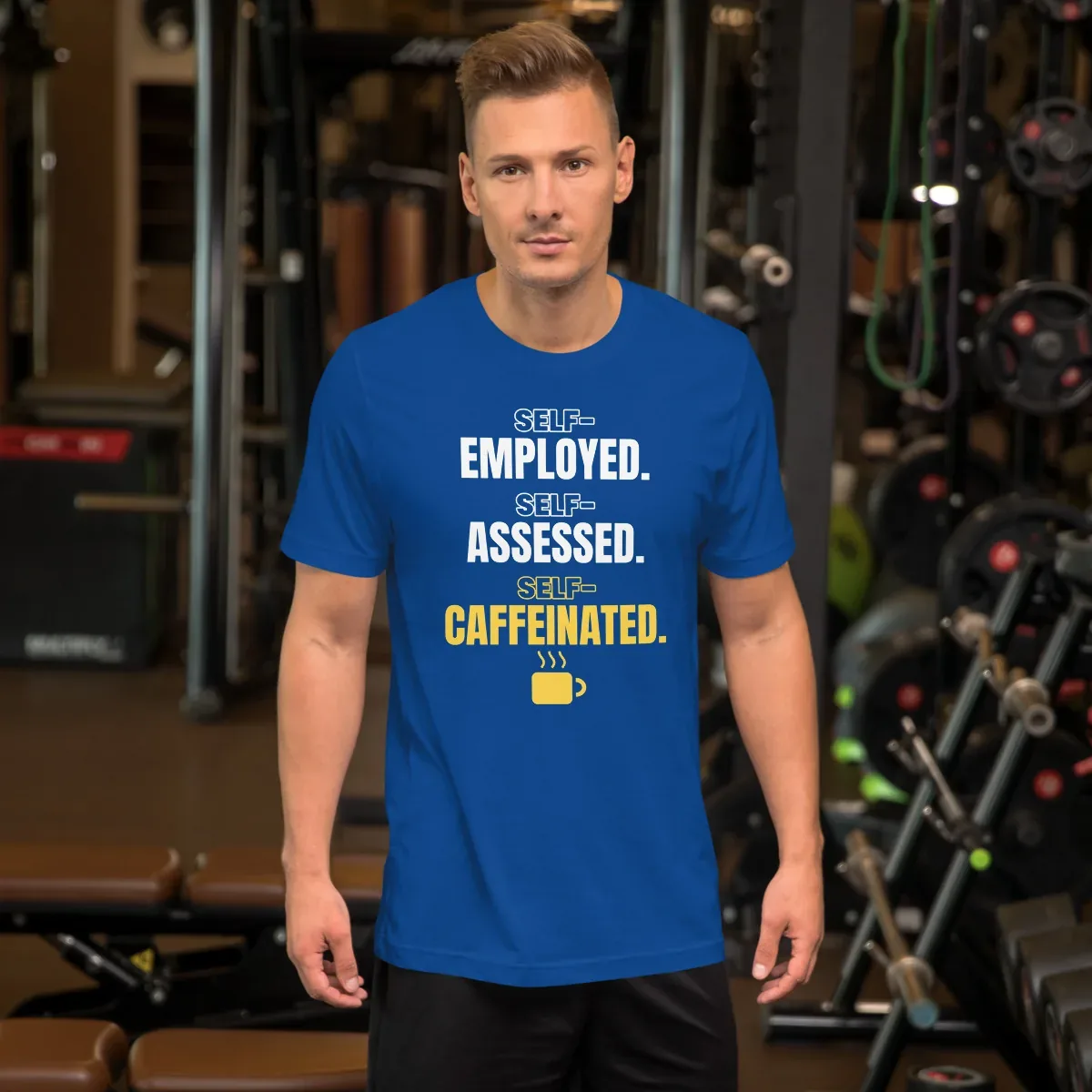 Self-employed. Self-assessed. Self-caffeinated. — unisex tee: Worn (lifestyle)