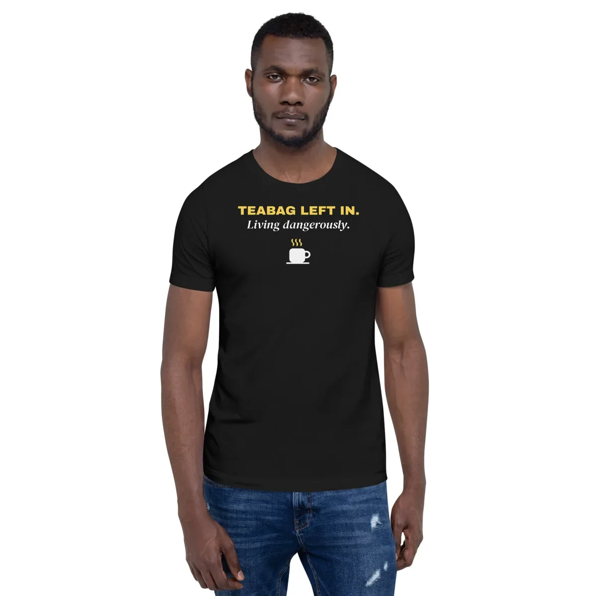 Teabag left in. Living dangerously. — black unisex tee: On model, front