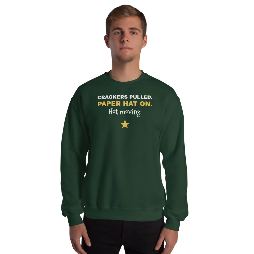 Crackers pulled. Paper hat on. Not moving. — forest green unisex sweatshirt: On model