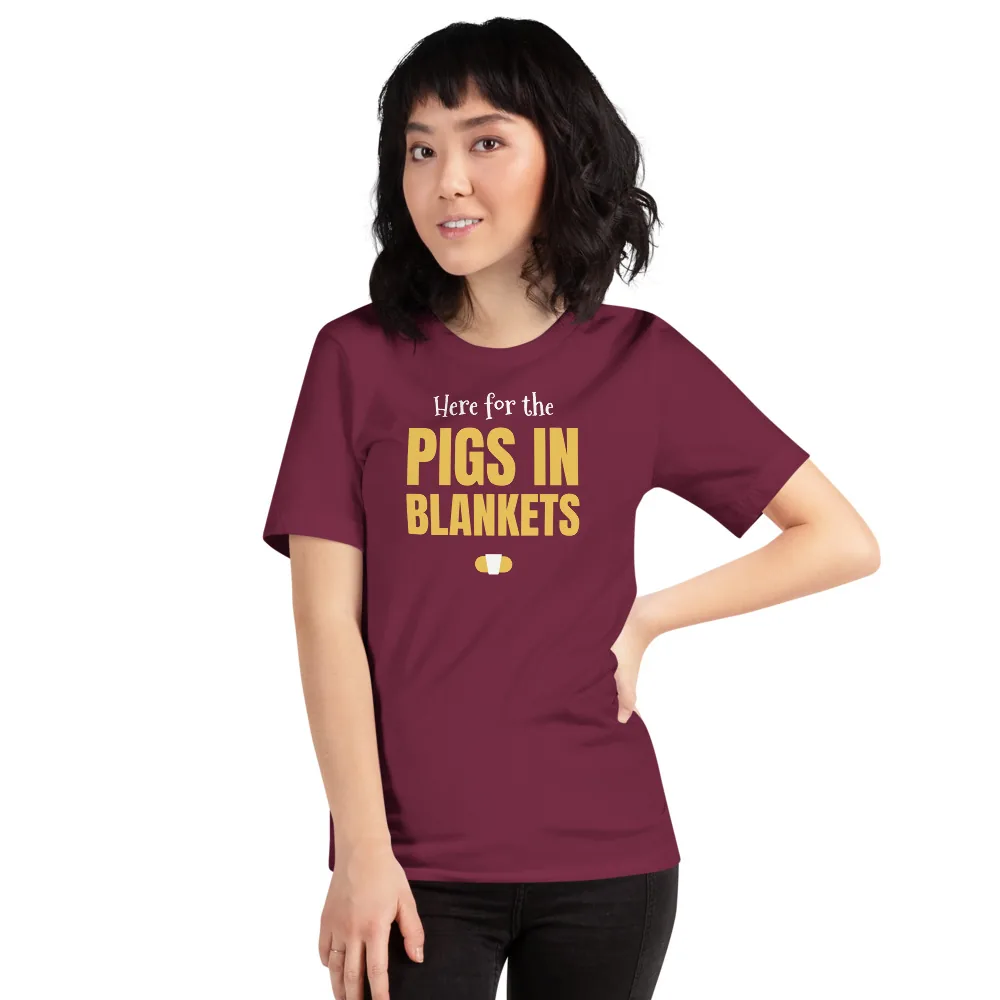 Here for the pigs in blankets — maroon unisex tee: On model, another person