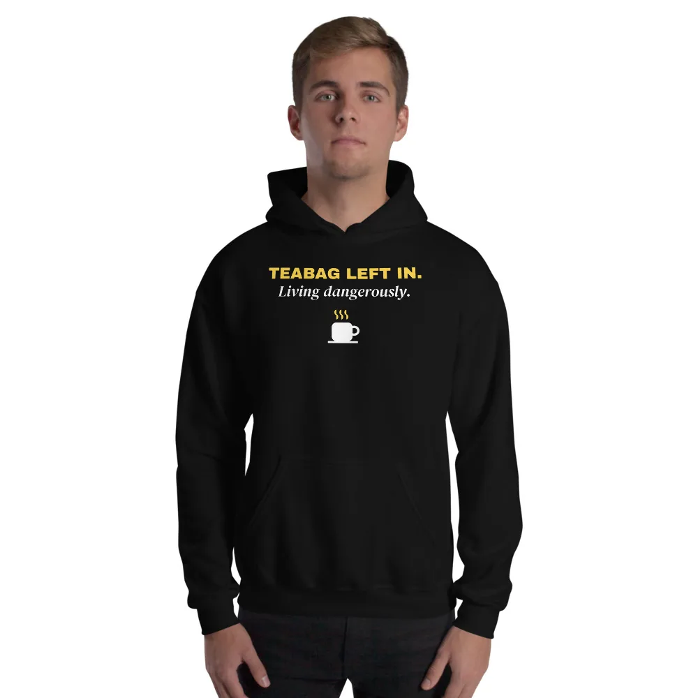 Teabag left in. Living dangerously. — black unisex hoodie: On model