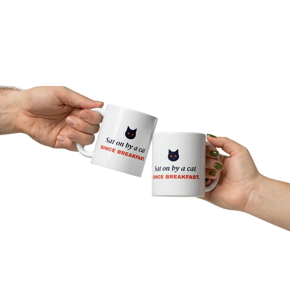 Sat on by a cat since breakfast — 11oz mug: In hand