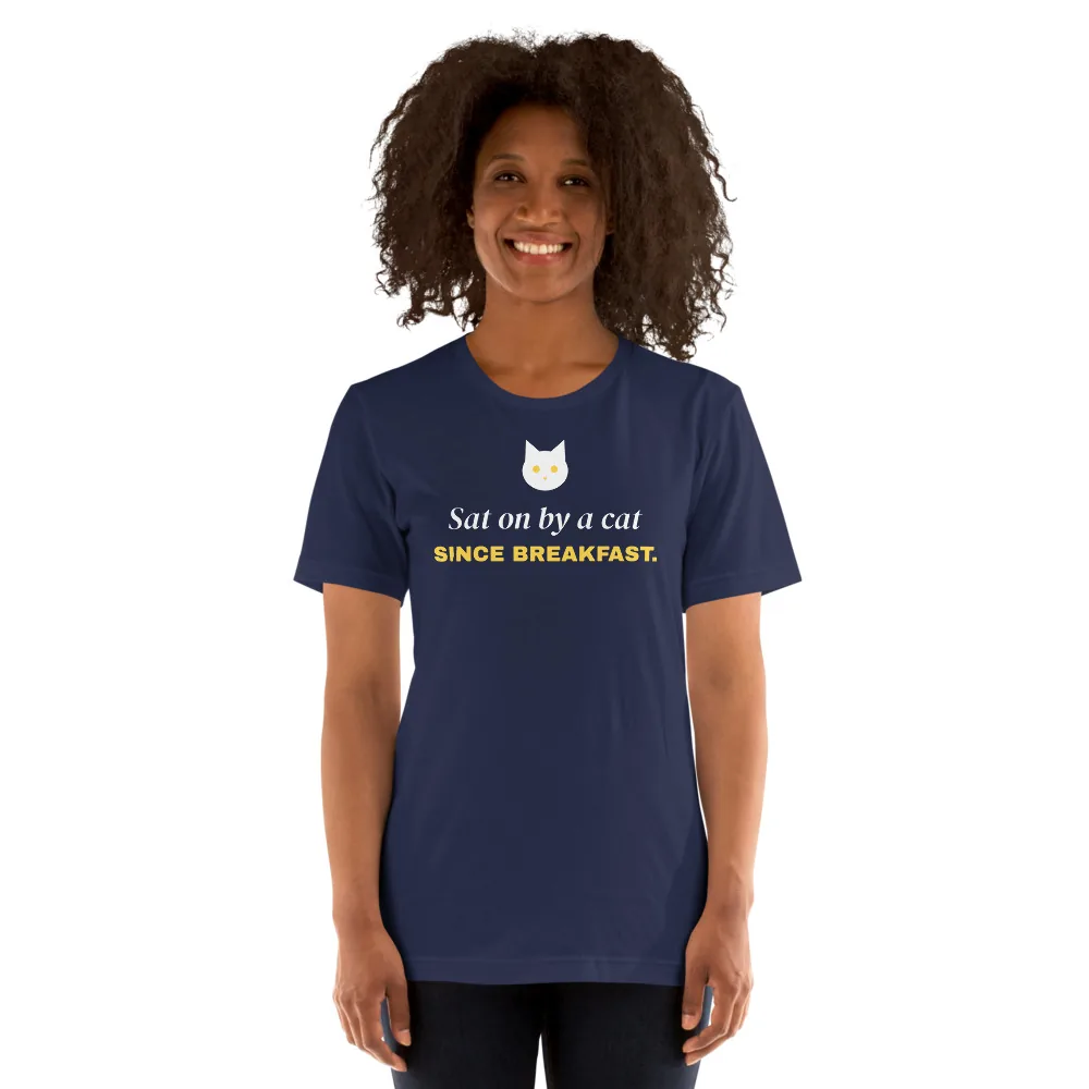 Sat on by a cat since breakfast — navy unisex tee: On model, another person
